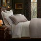 Savoy Jacquard Duvet and Shams on a bed in a moody bedroom, Platinum