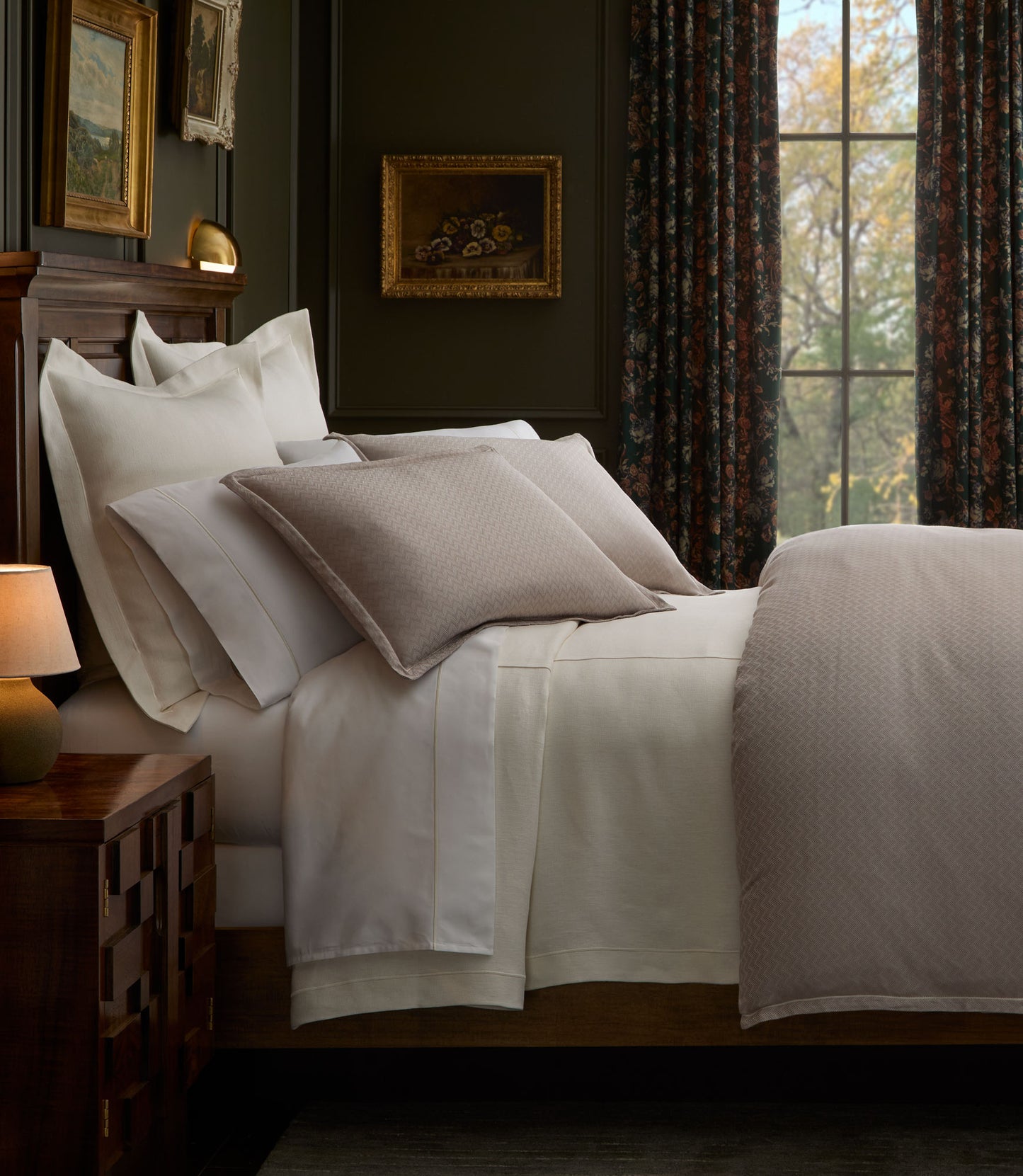 Savoy Jacquard Duvet and Shams on a bed in a moody bedroom, Platinum