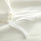 Detail of duvet ties, Ivory
