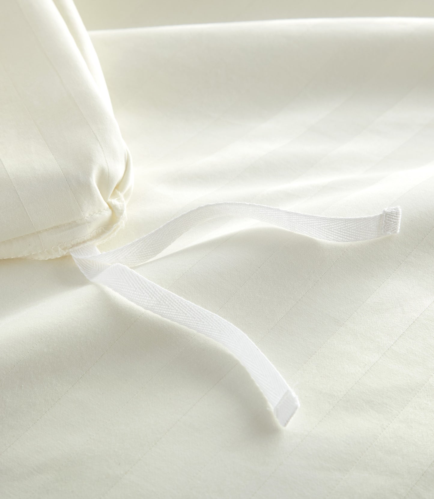Detail of duvet ties, Ivory