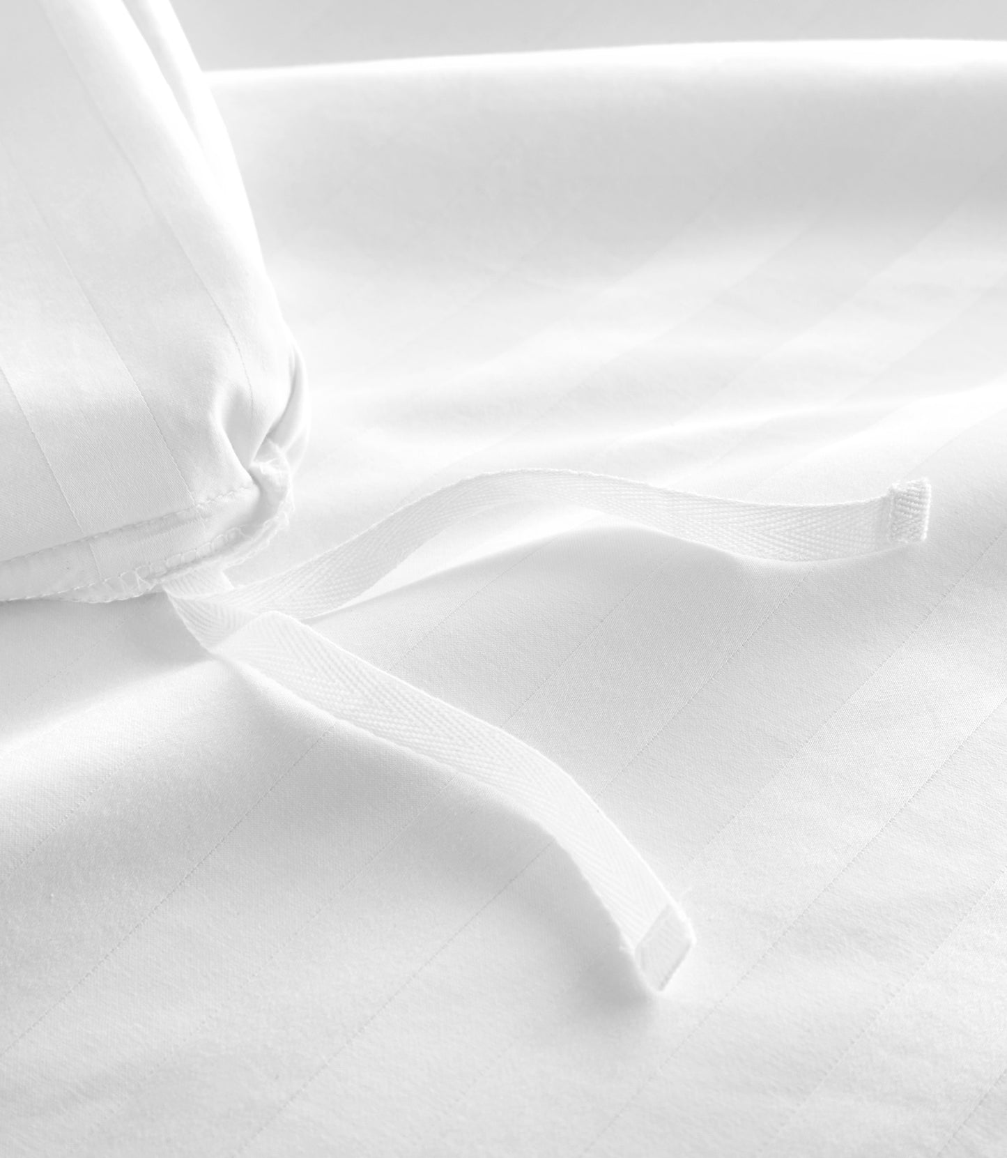 Detail of duvet ties, White