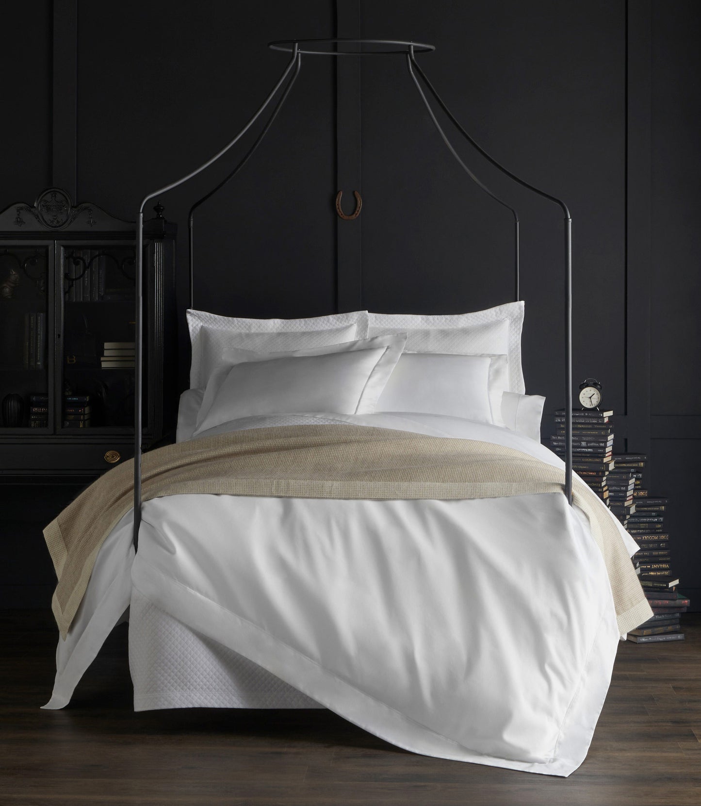 Soprano sateen bedding on bed in black room, White