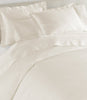 Lyric Duvet Cover and Shams on Bed in Ivory