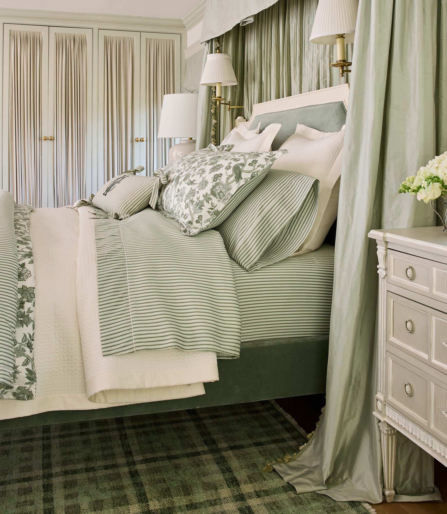 Windsor Stripe Classic Printed Sheet Set on a green bed in an elegant room with light green decorative curtains, Stripe Moss