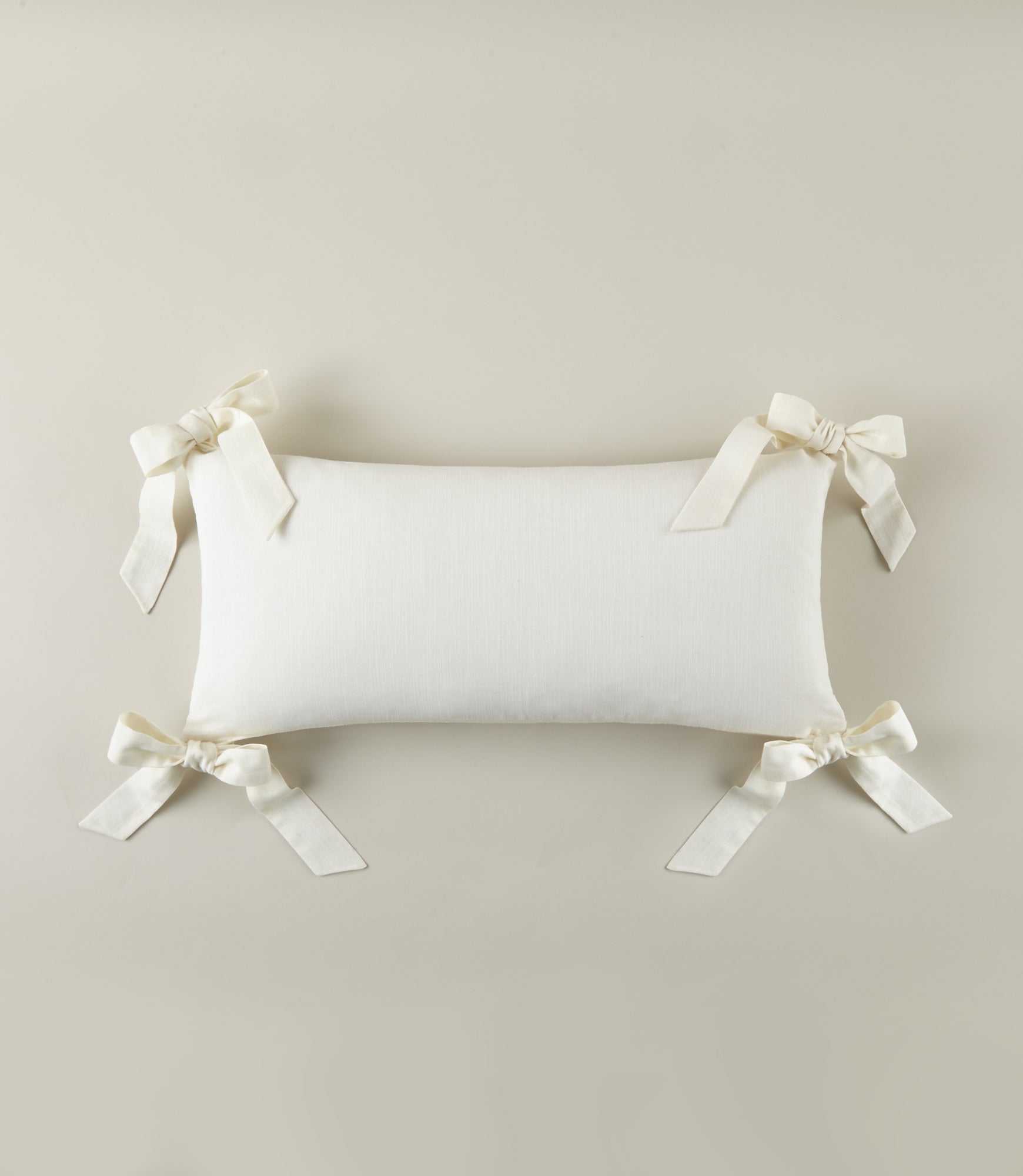 Caitlin Oblong Bow Pillow | Caitlin Wilson x Peacock Alley