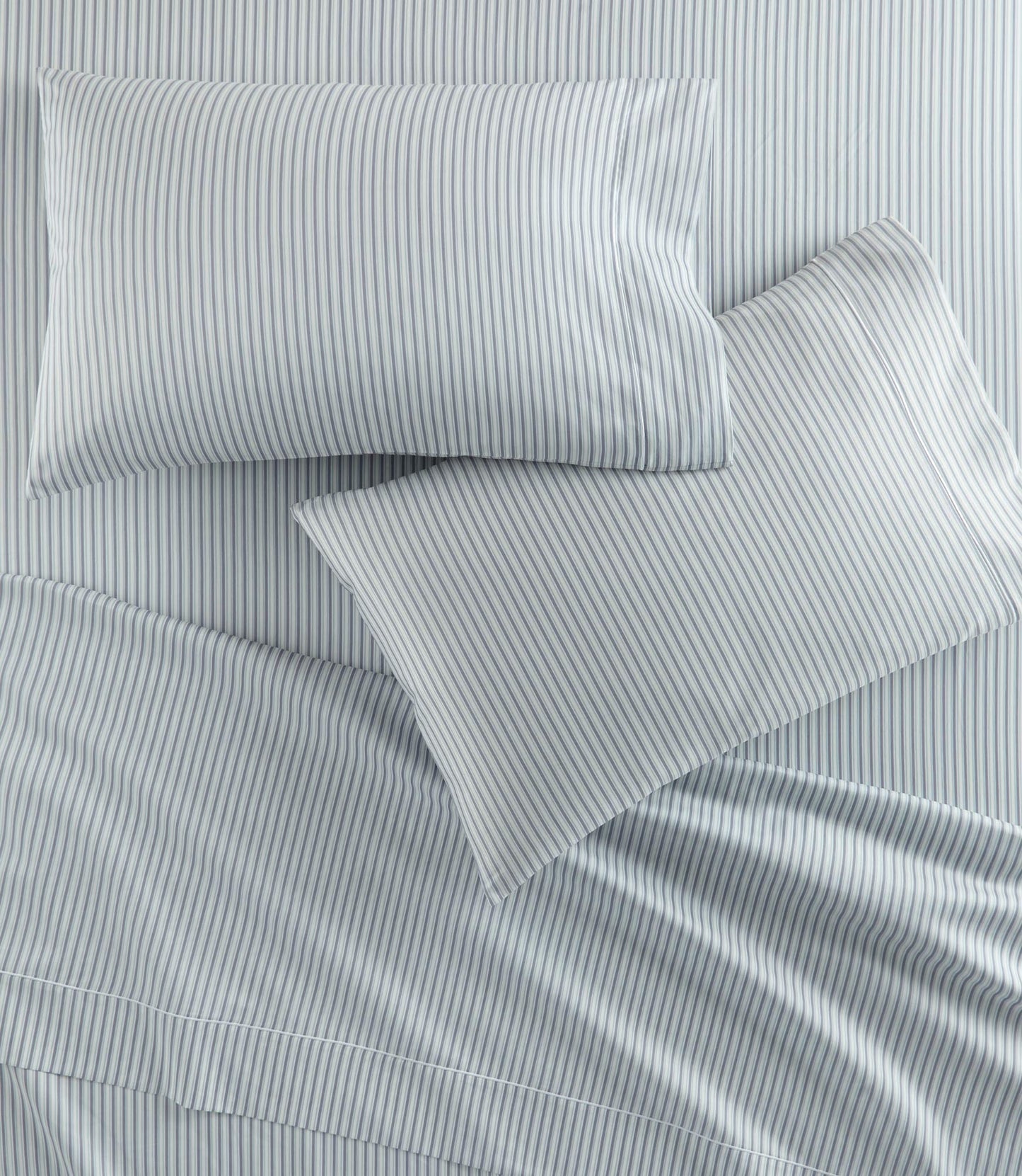 Windsor Stripe Pillowcases on bed, Stripe Wedgewood