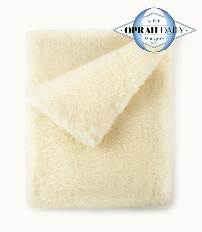 Folded Wool Mattress Topper, Natural with Oprah Daily Sleep O Wards logo in the corner