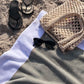 Flatlay of a Soleil Beach Towel White Trim with sunglasses, sandals and a straw tote