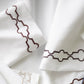 Modern greek key design embroidered cuff sateen sheets