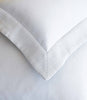 Fabric detail of a angelina matelasse sham and coverlet White