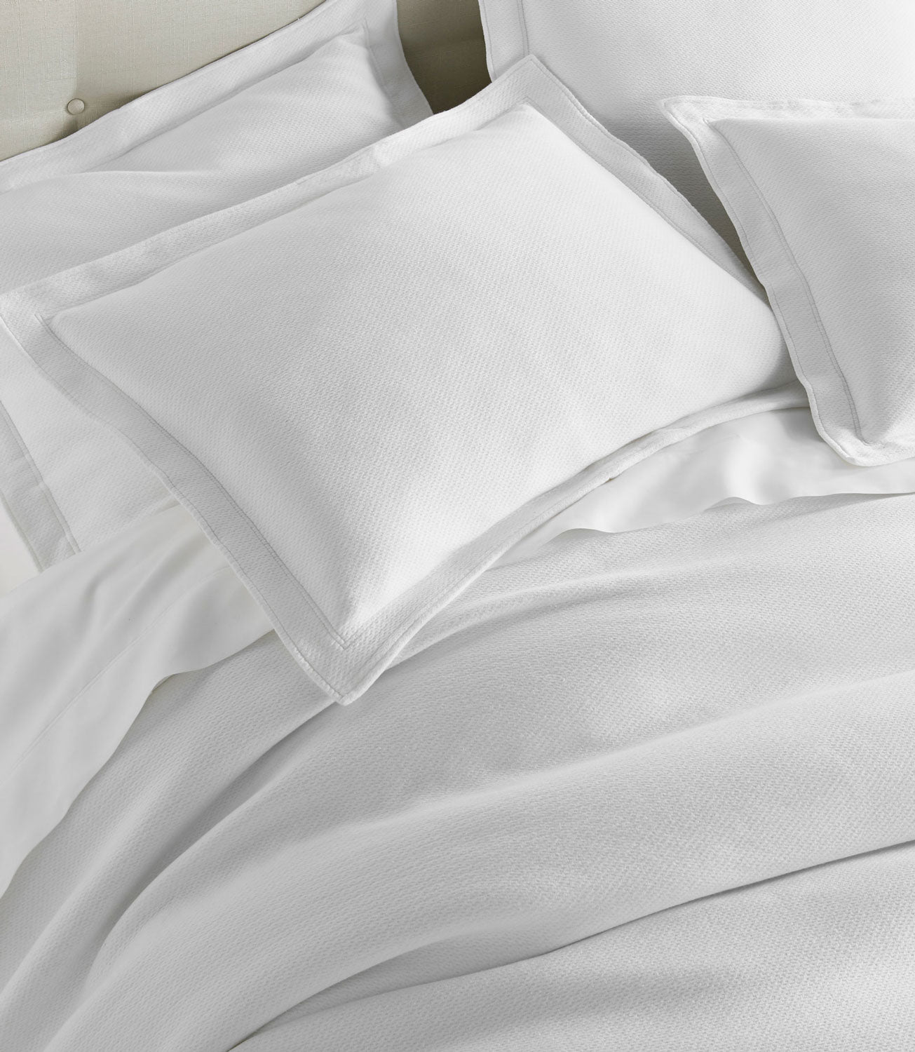 Angie Stonewashed Matelasse sham on bed White