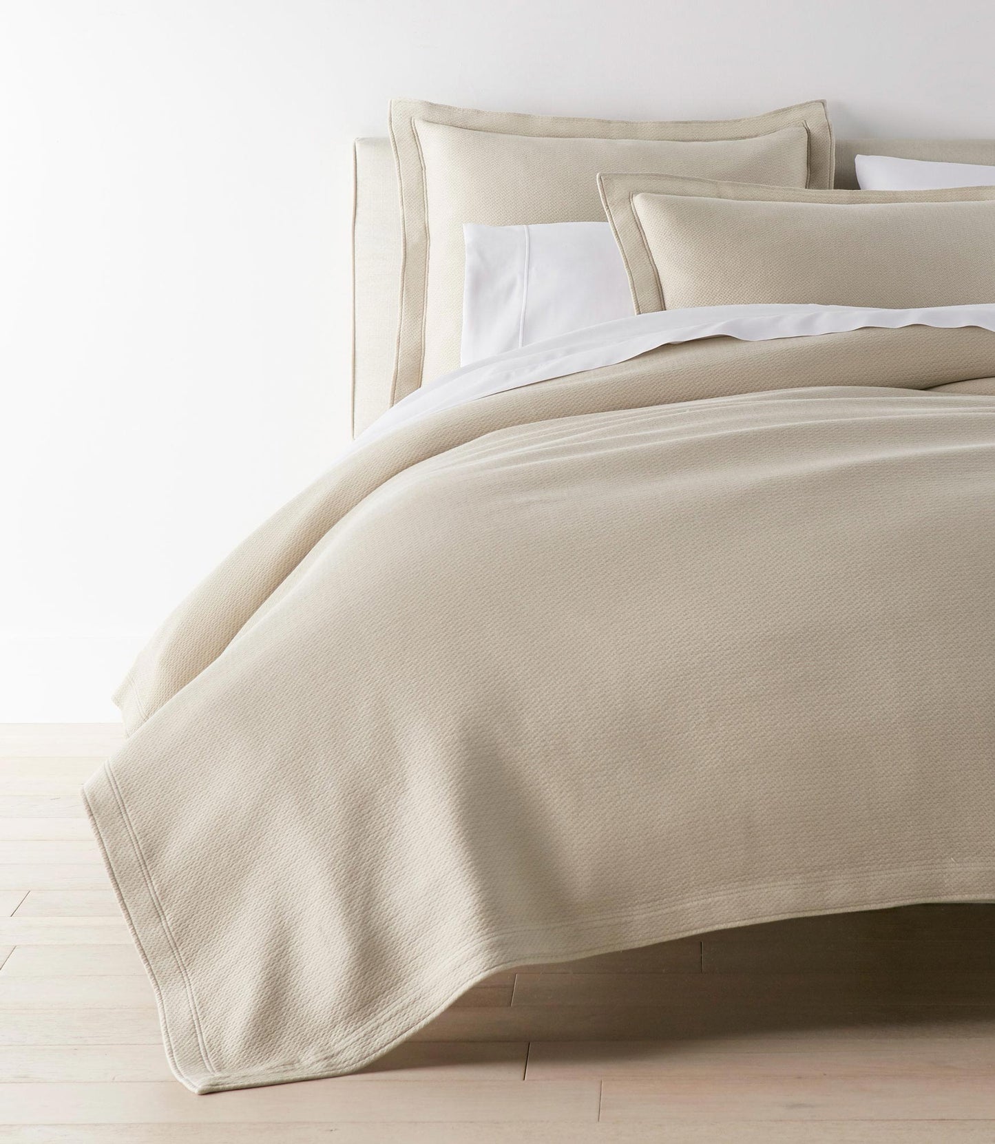 Angie Stonewashed Matelasse Coverlet Dune on bed