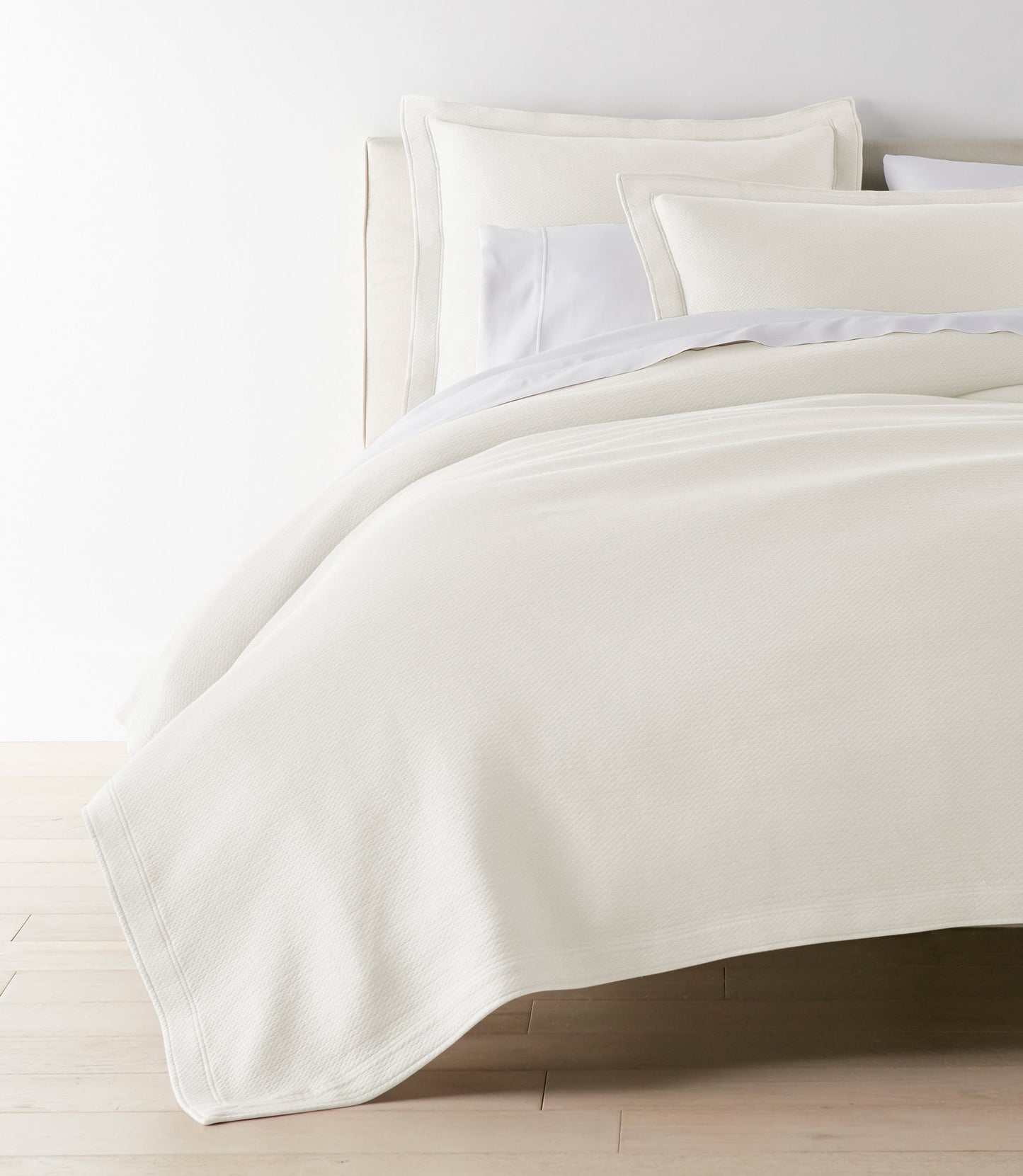 Angie Stonewashed Matelasse Coverlet Pearl on bed