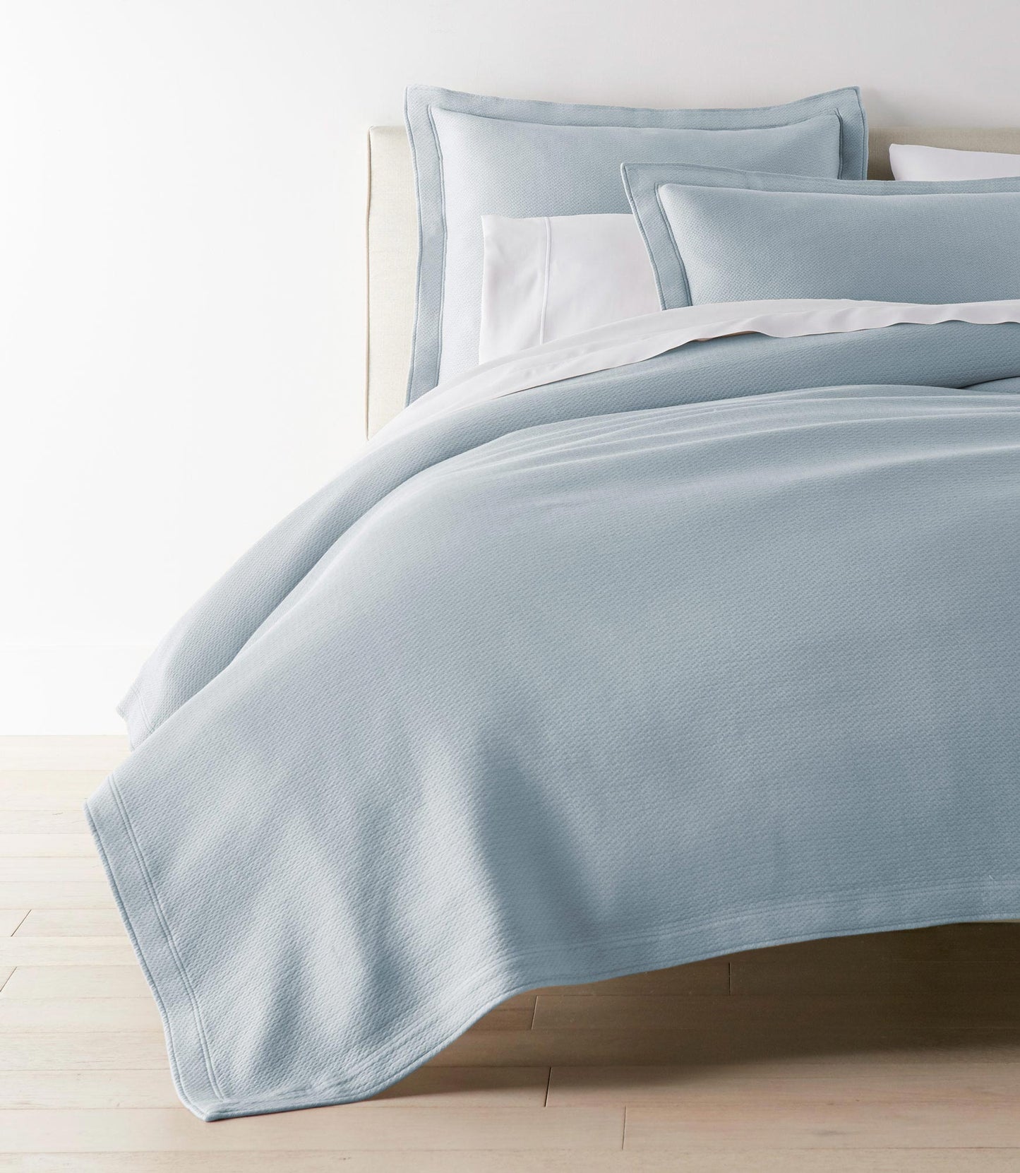 Angie Stonewashed Matelasse Coverlet Smokey Blue on bed