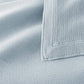 Angie Stonewashed Matelasse Sham corner detail Smokey Blue