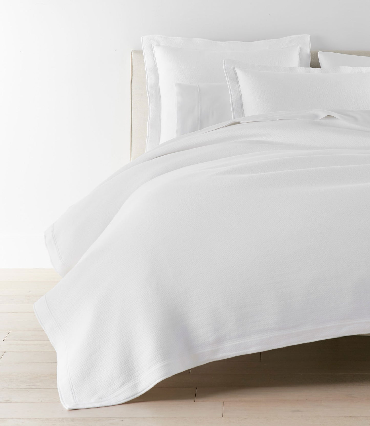 Angie Stonewashed Matelasse Coverlet White on bed