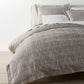 Biagio Linen Duvet Cover on a Bed