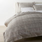 Biagio Duvet Cover on a Bed, Linen