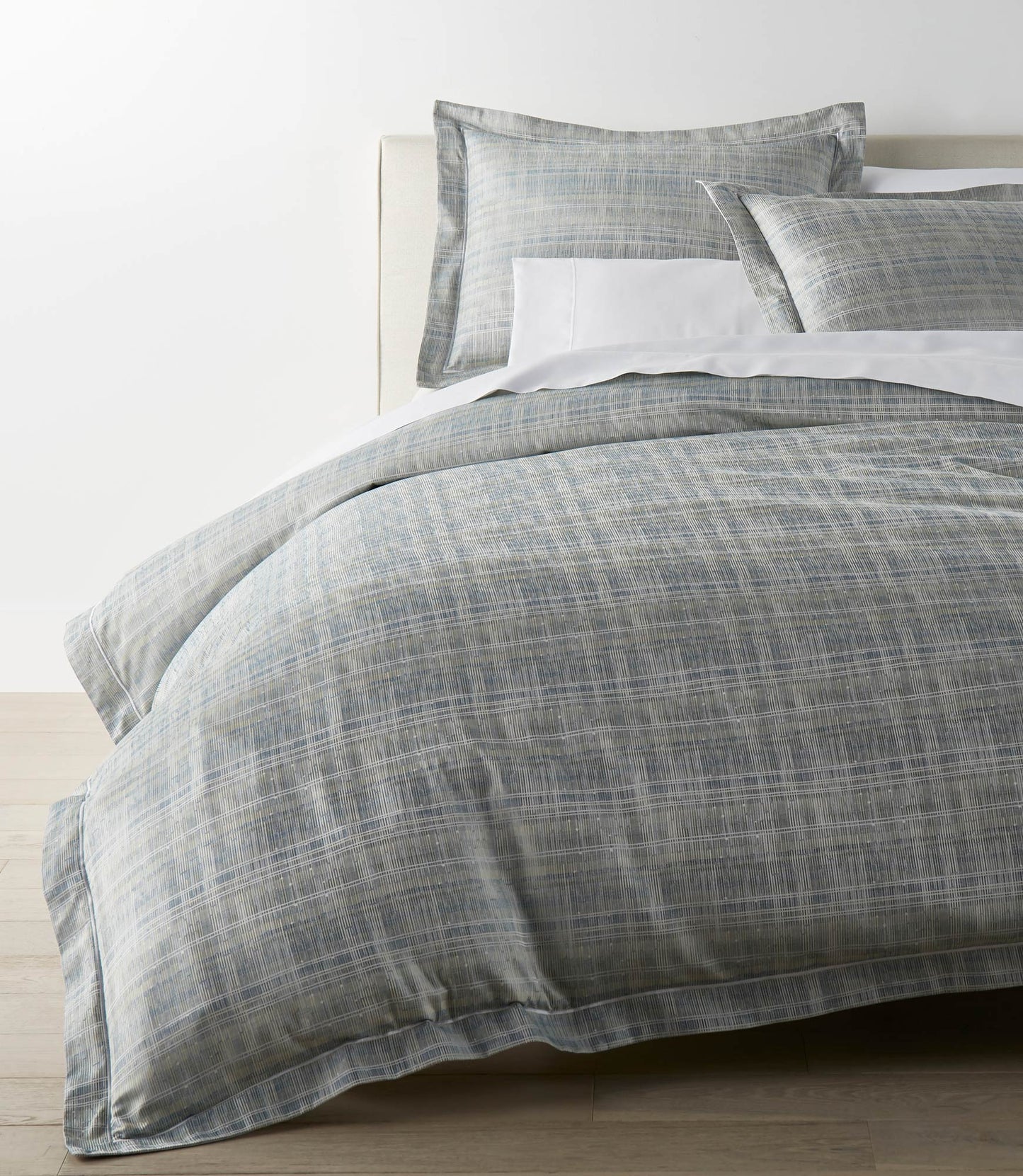 Biagio Aloe Duvet Cover on a Bed