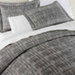 Biagio Jacquard Shams on bed Charcoal