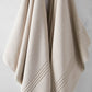 Chelsea Plush Bath Towel in Neutral Colors Hanging 