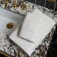 Coronado Luxe Bath Towels Place On Bathroom Sink