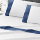 Modern Cuff Sateen Sheet Set Marine on Bed