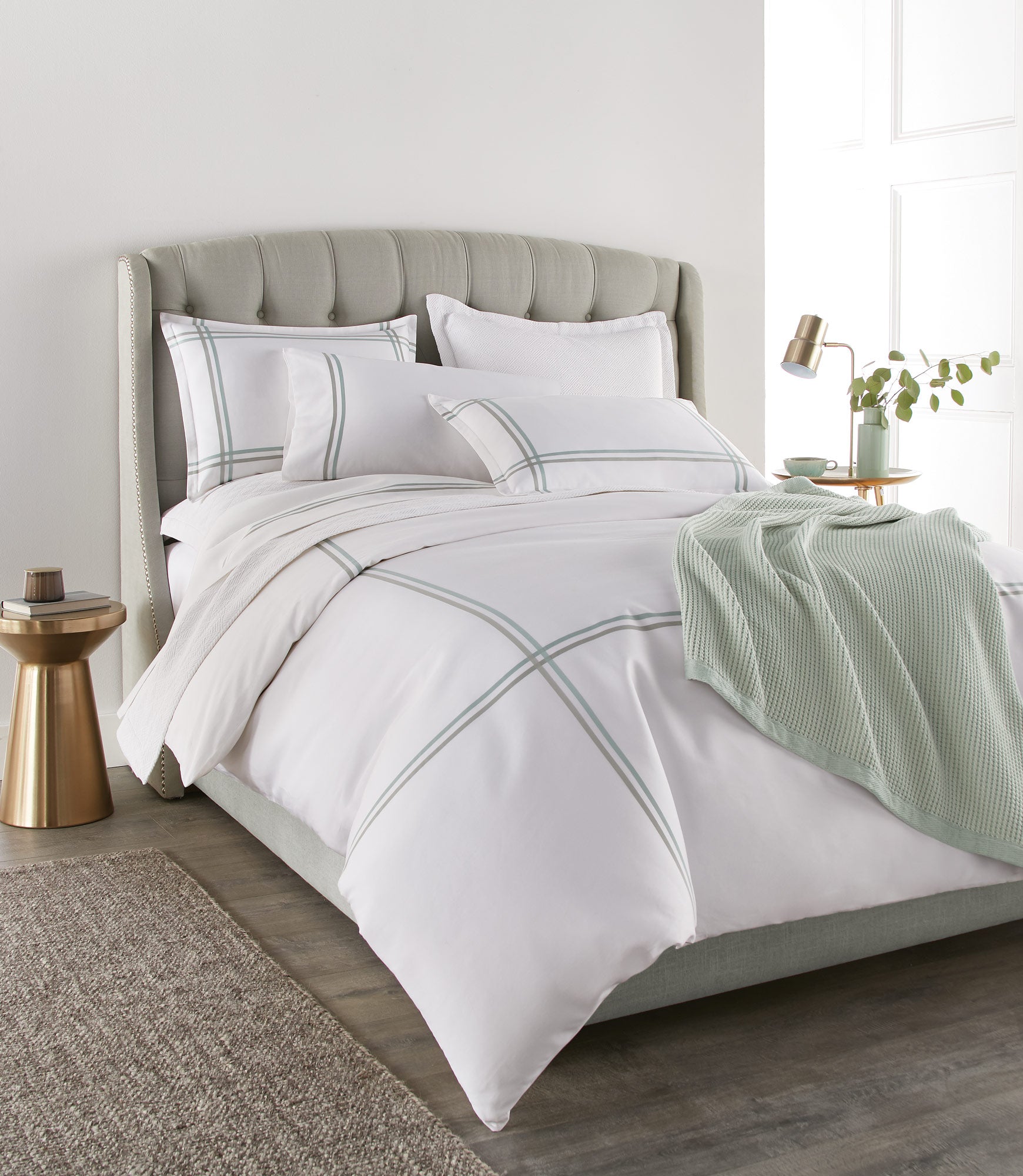 Duo Duvet and Shams Sage on Bed
