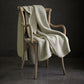 Alta Reversible Cotton Blanket On A Chair Pearl