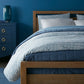 Fern Duvet Cover in Denim on Bed in Blue Room