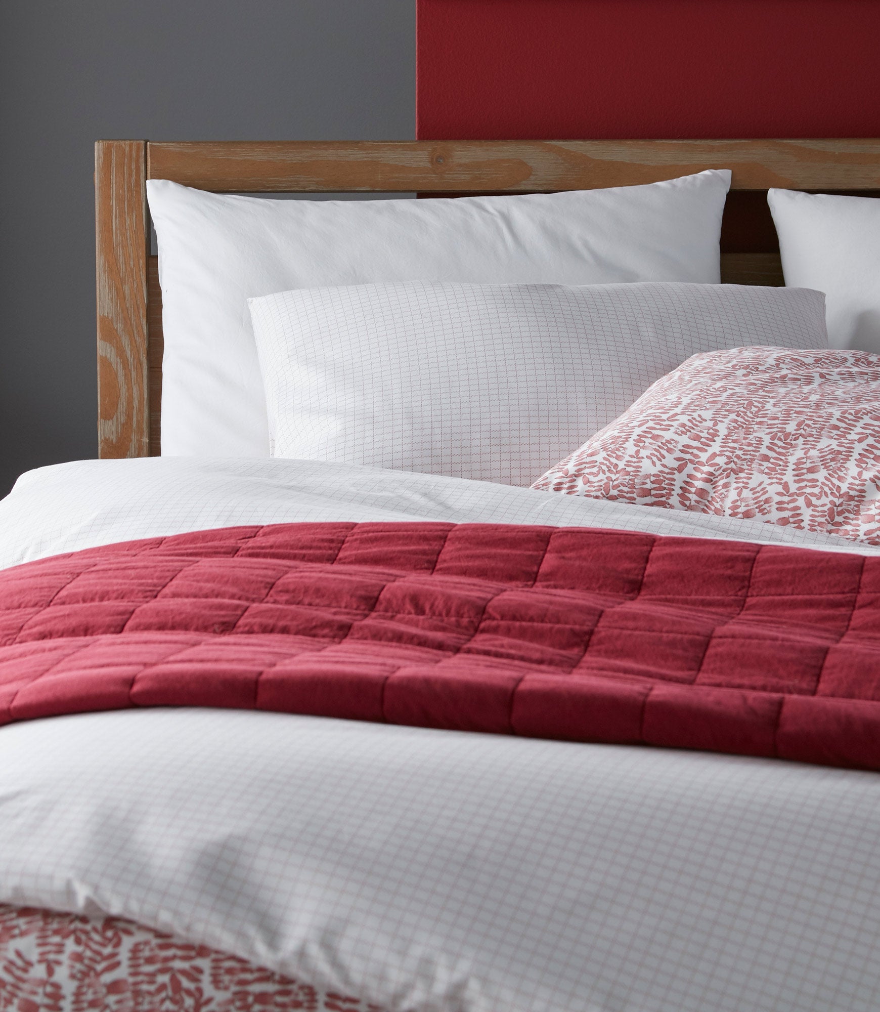 Grid Berry Duvet Cover and Shams on Bed