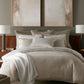 bedroom with neutral bedding with honeycomb pattern Linen