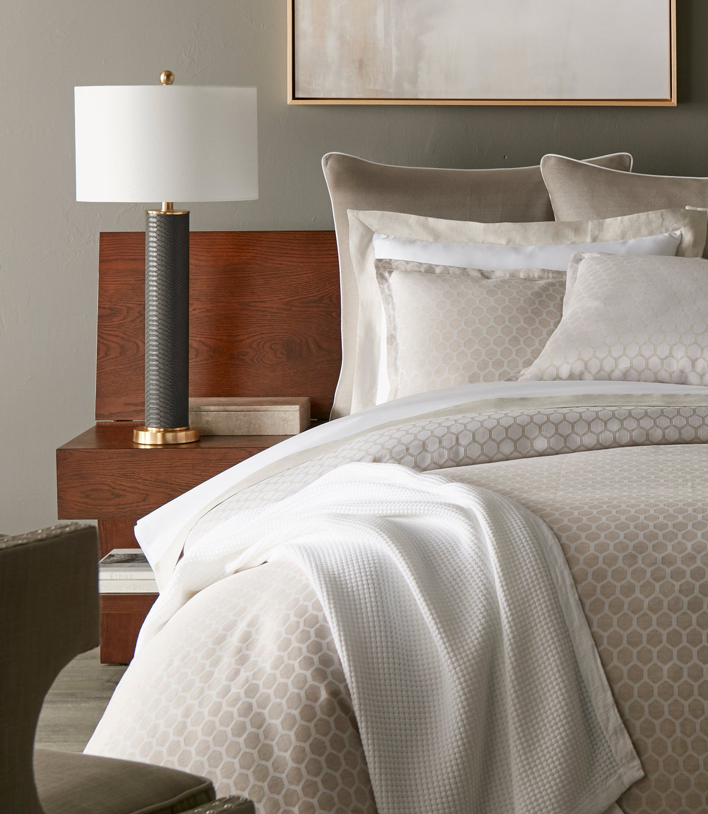 Honeycomb Reversible Duvet Cover and Shams on Bed in Hotel Room Linen