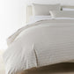 Houndstooth Percale Duvet Cover Greige on bed