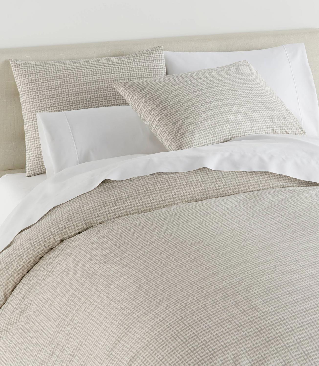 Houndstooth Percale Sleeping Shams Greige on bed