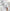 woman in white bath robe hand in pocket - Secondary Image