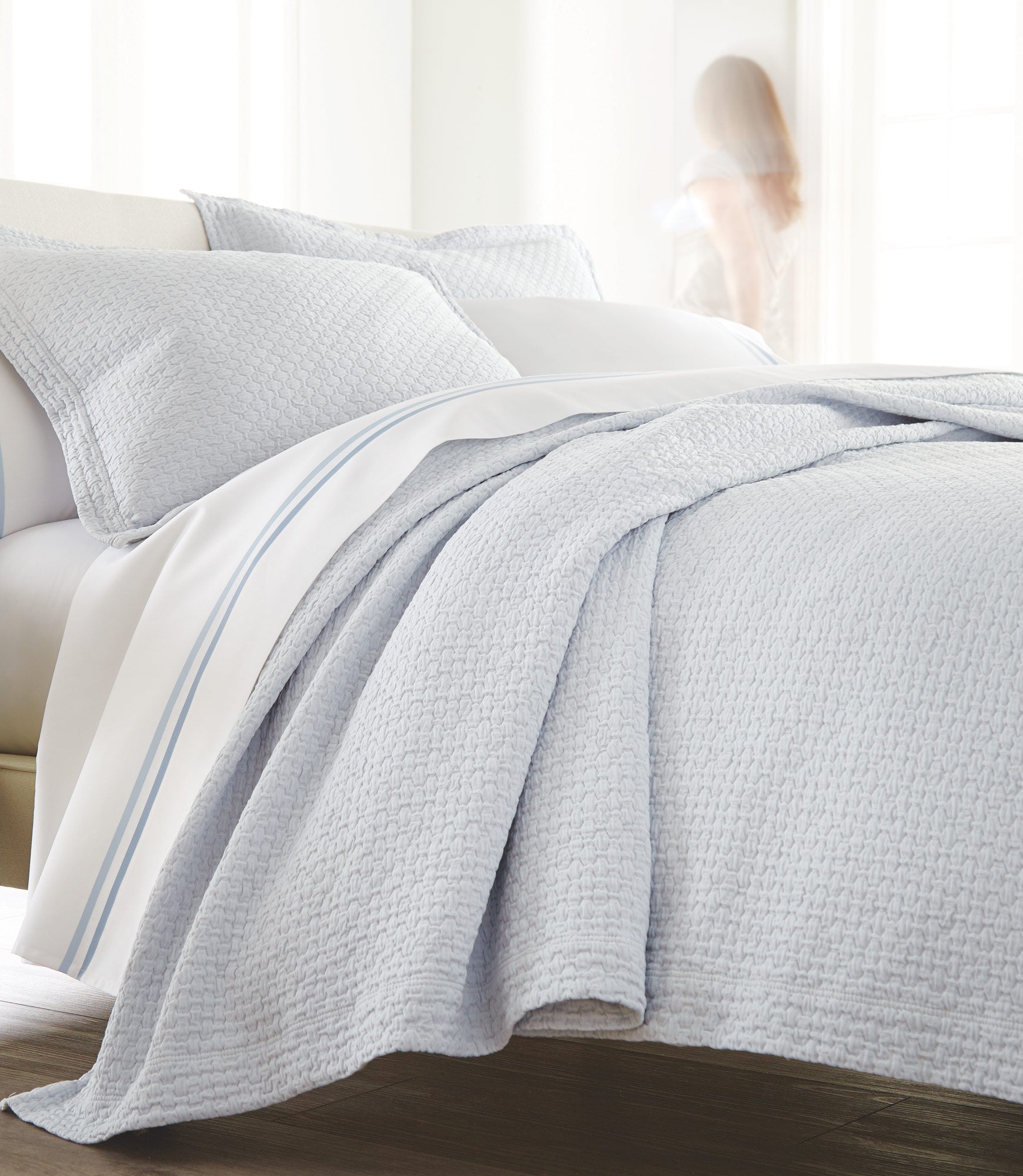 Juliet Matelassé Coverlet Barely Blue on Bed