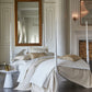 Lucia Matelassé Coverlet Champagne and Pearl on Bed