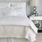 Lucia Matelassé Coverlet Pearl on Bed white