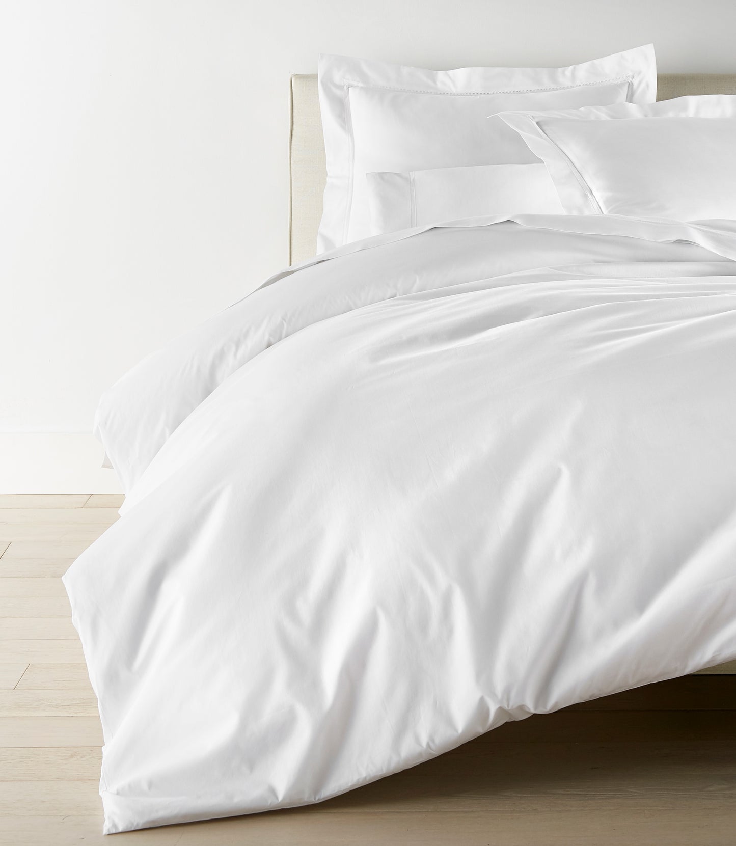 Lyric Duvet Cover and Shams on Bed in White 