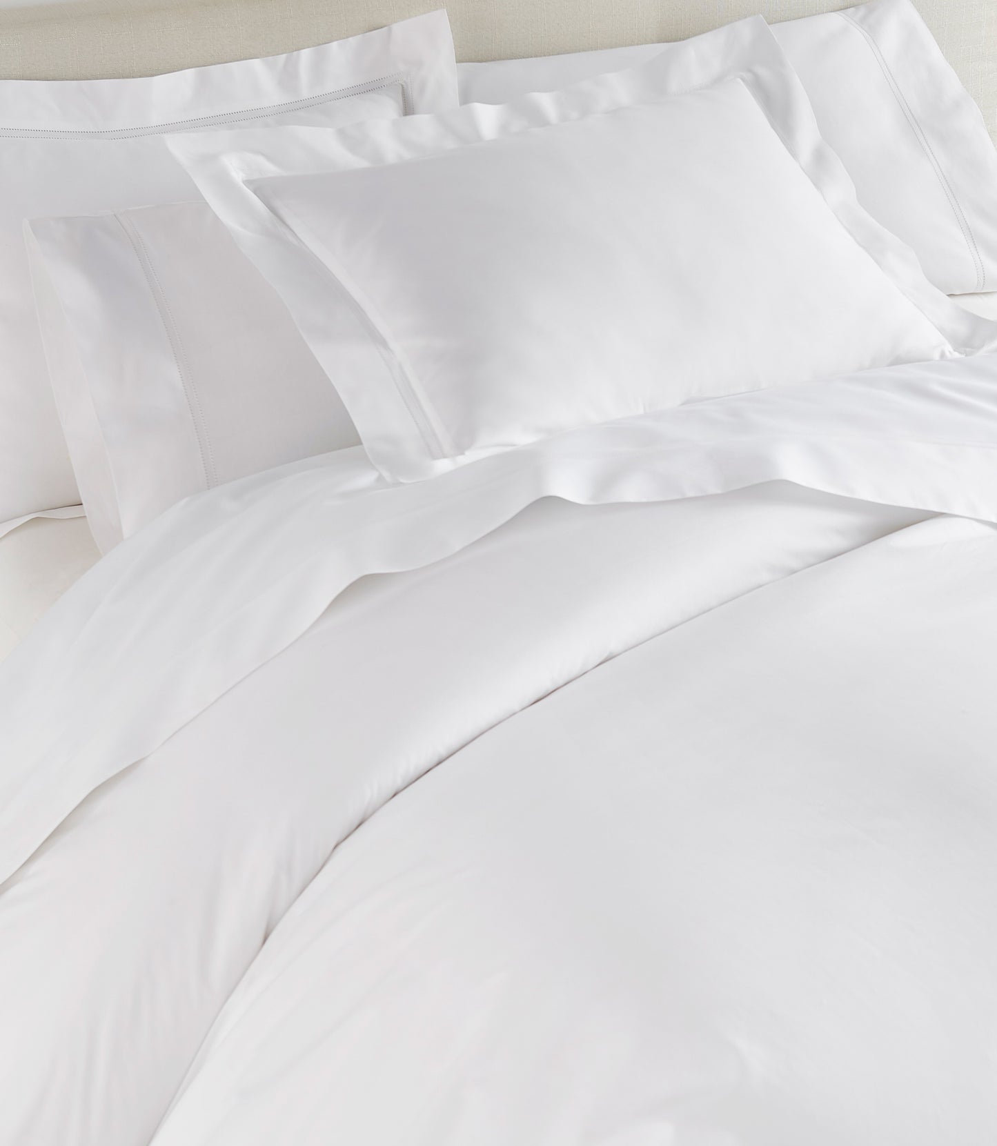 Lyric Duvet Cover and Shams on Bed in White 