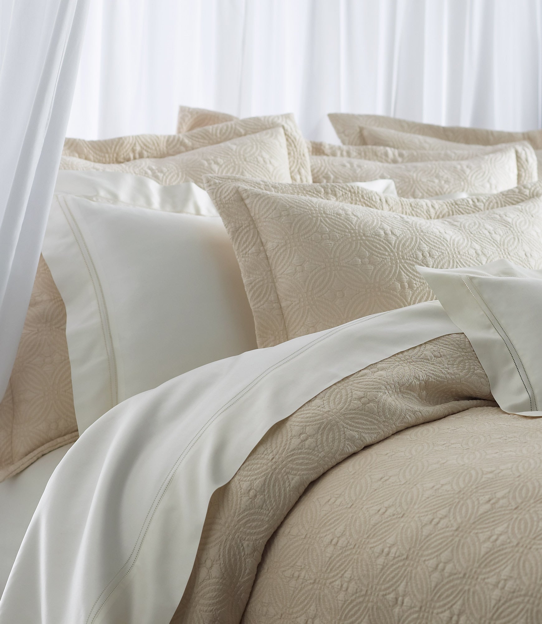 Lyric Percale Flat Sheet Ivory on Bed With Lucia
