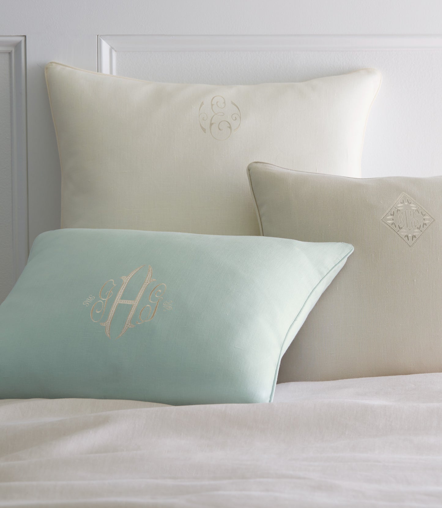 Mandalay Decorative Pillows On Bed Lagoon Linen Pearl Colors