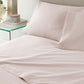 Nile Sheet Set Dusty Pink on bed