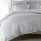 Pousada Linen Duvet Cover and Shams on a Bed Gray