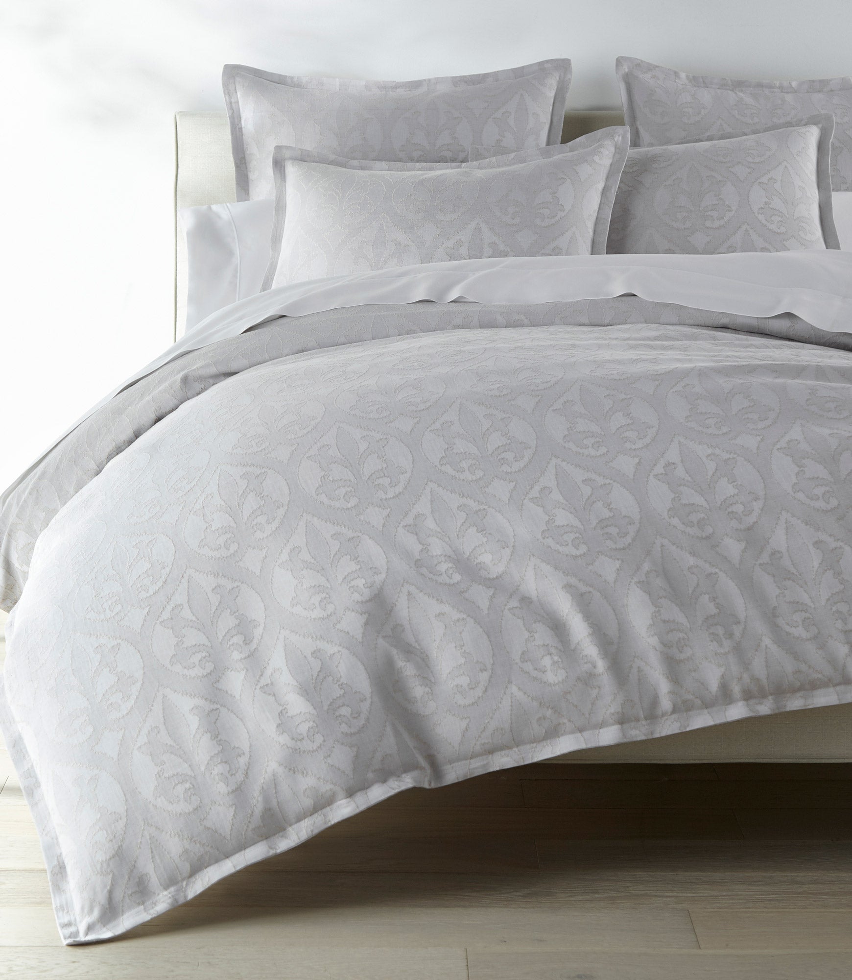 Pousada Linen Duvet Cover and Shams on a Bed Gray