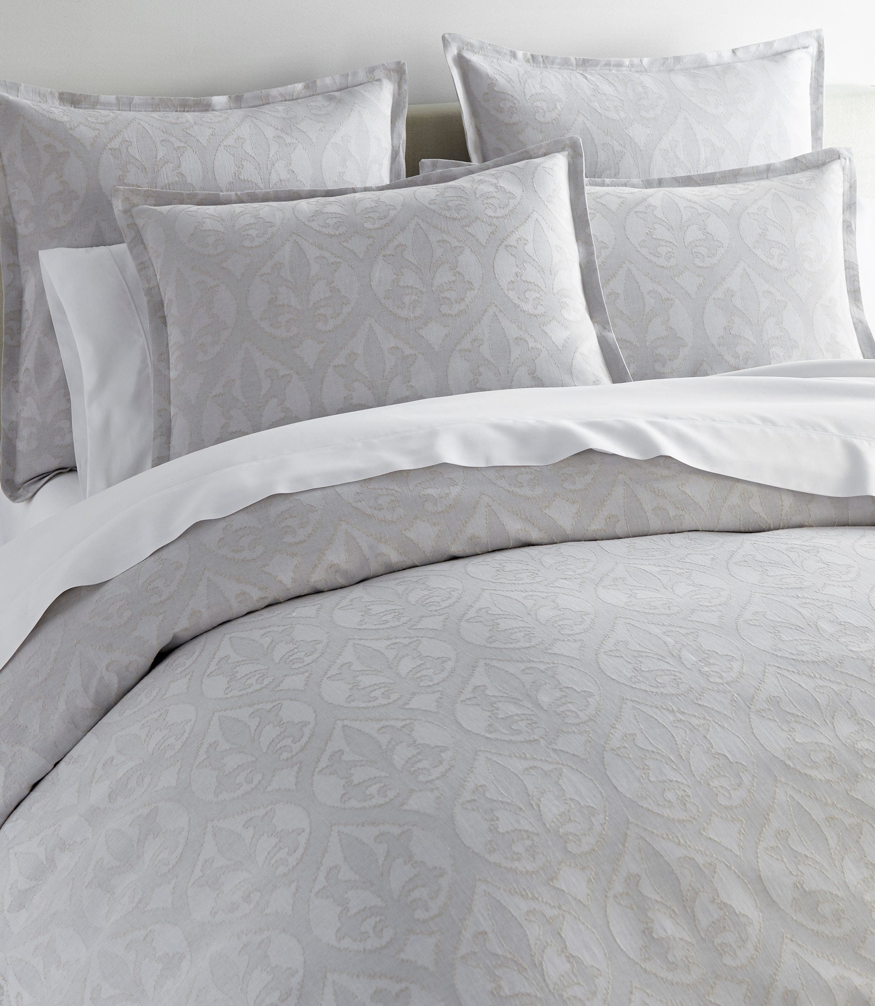 Pousada Linen Duvet Cover and Shams on a Bed Gray