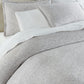 Ravenna Jacquard Shams on bed Light Gray