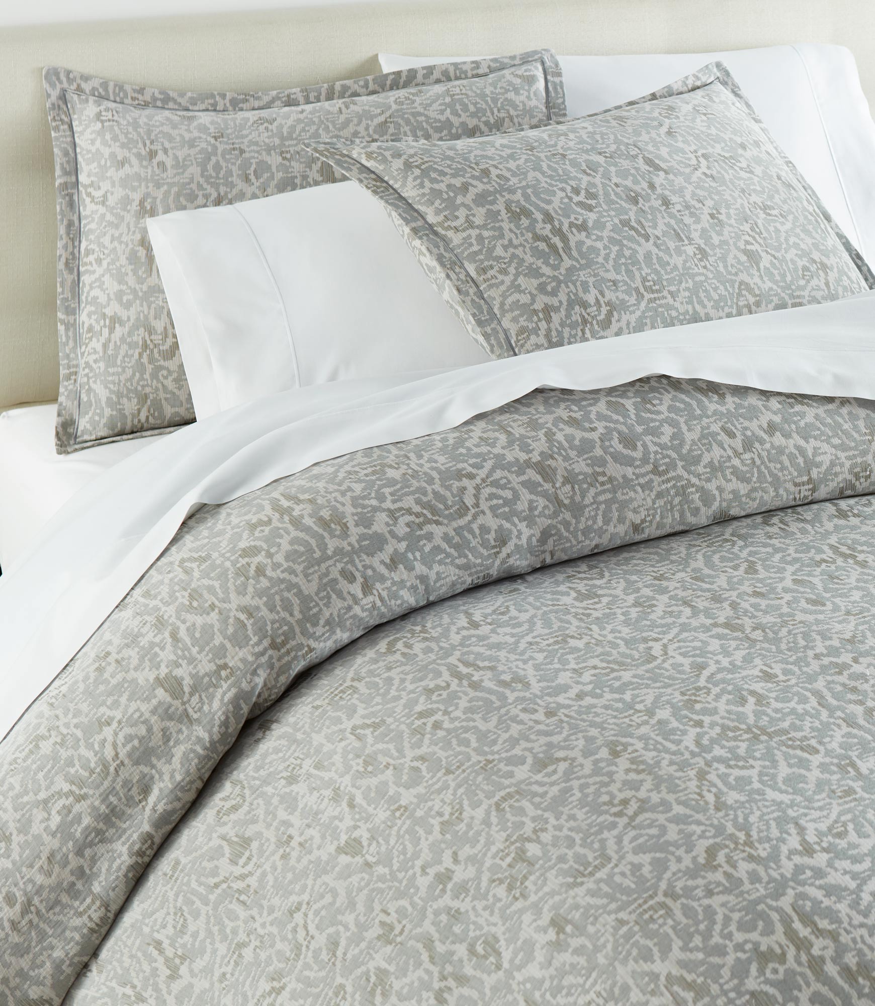 Ravenna Jacquard Sham on bed Pine