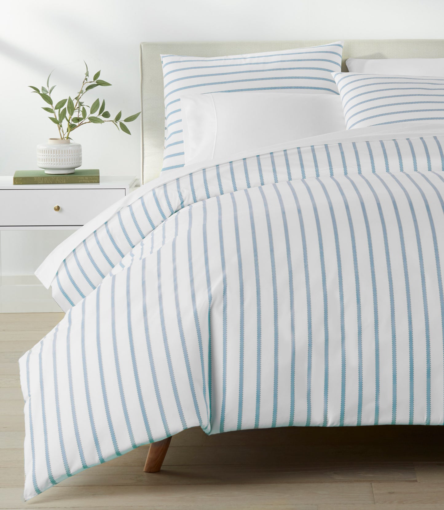 ribbon stripe percale Denim duvet cover on a bed